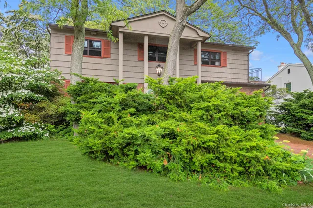 a view of a house with a garden