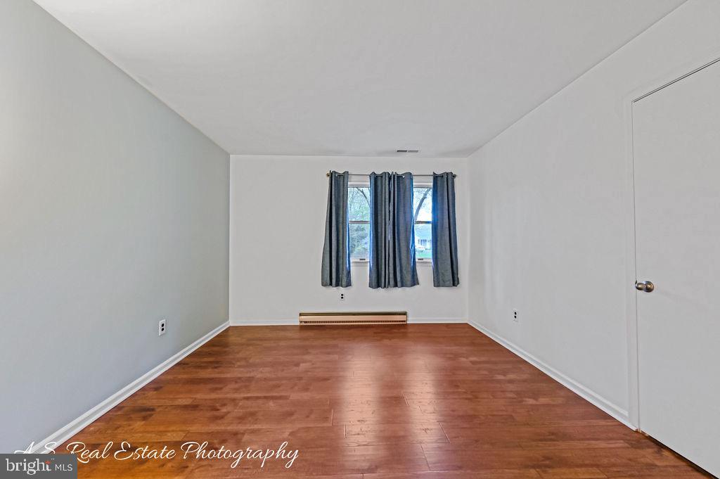 30833 Dogwood Drive Laurel, DE 19956 - Photo 15 of 27 a view of an empty room with wooden floor