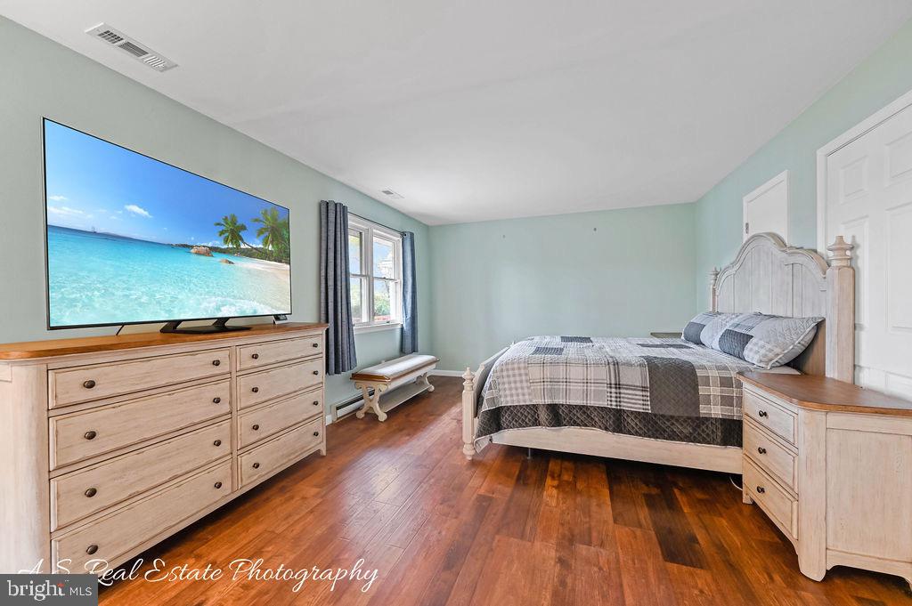 30833 Dogwood Drive Laurel, DE 19956 - Photo 16 of 27 a bedroom with furniture and flat screen tv