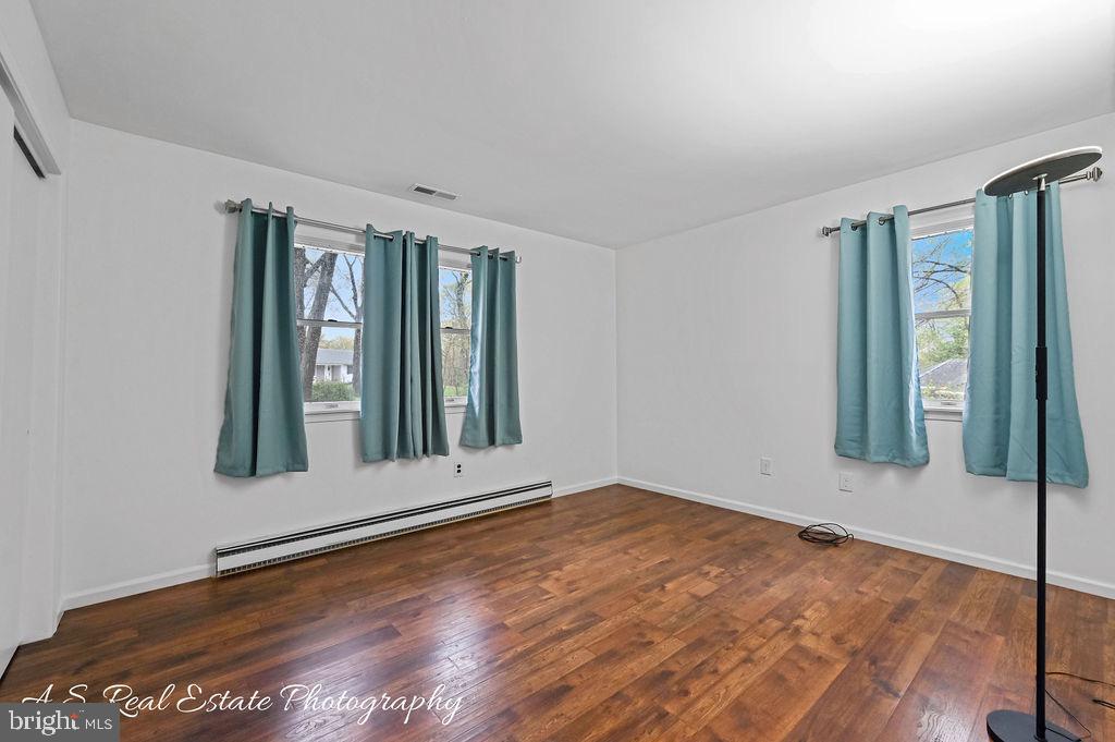 30833 Dogwood Drive Laurel, DE 19956 - Photo 18 of 27 a view of an empty room with glass door and balcony