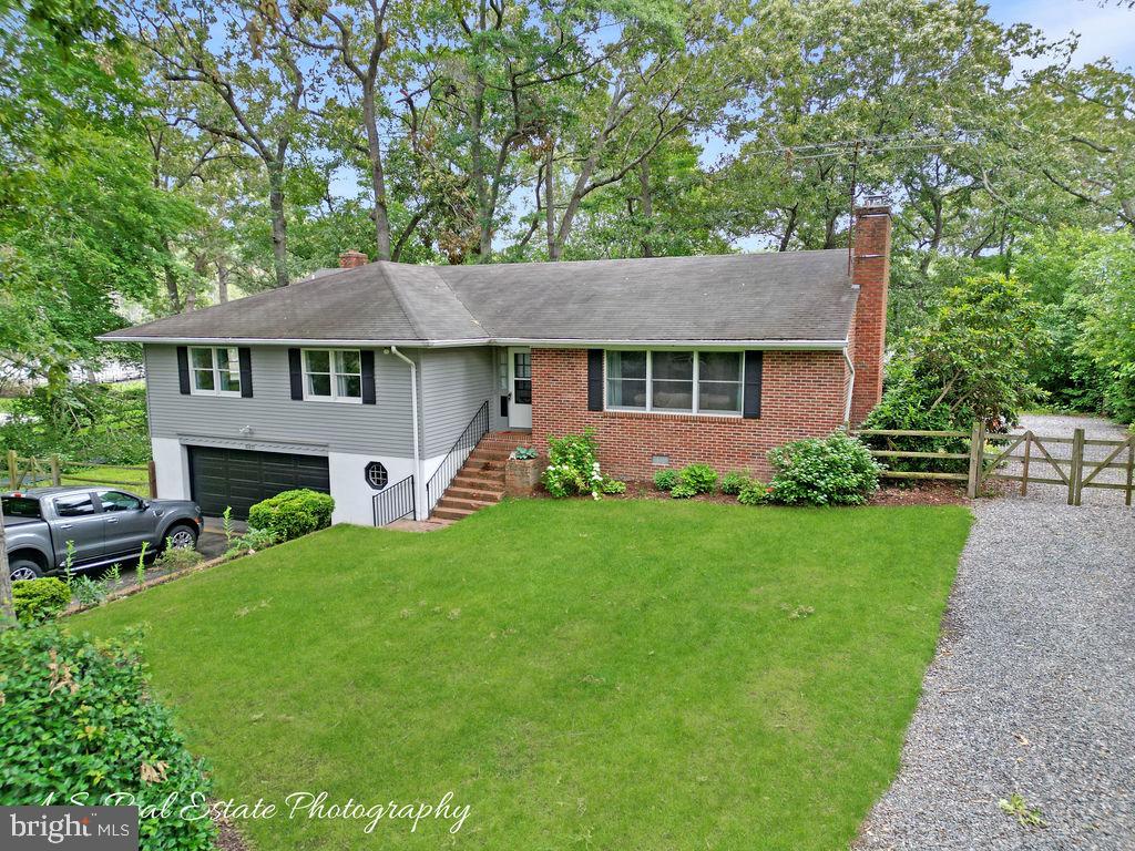 30833 Dogwood Drive Laurel, DE 19956 - Photo 24 of 27 a front view of house with yard and green space