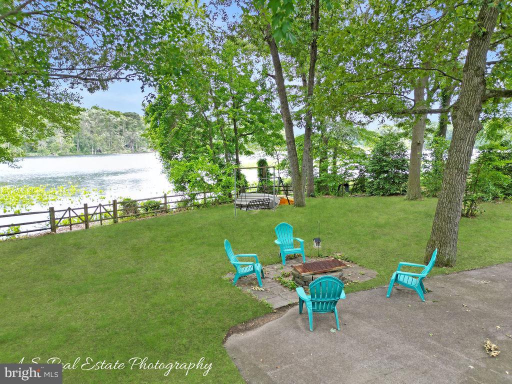 30833 Dogwood Drive Laurel, DE 19956 - Photo 26 of 27 a view of a table and chairs in the garden