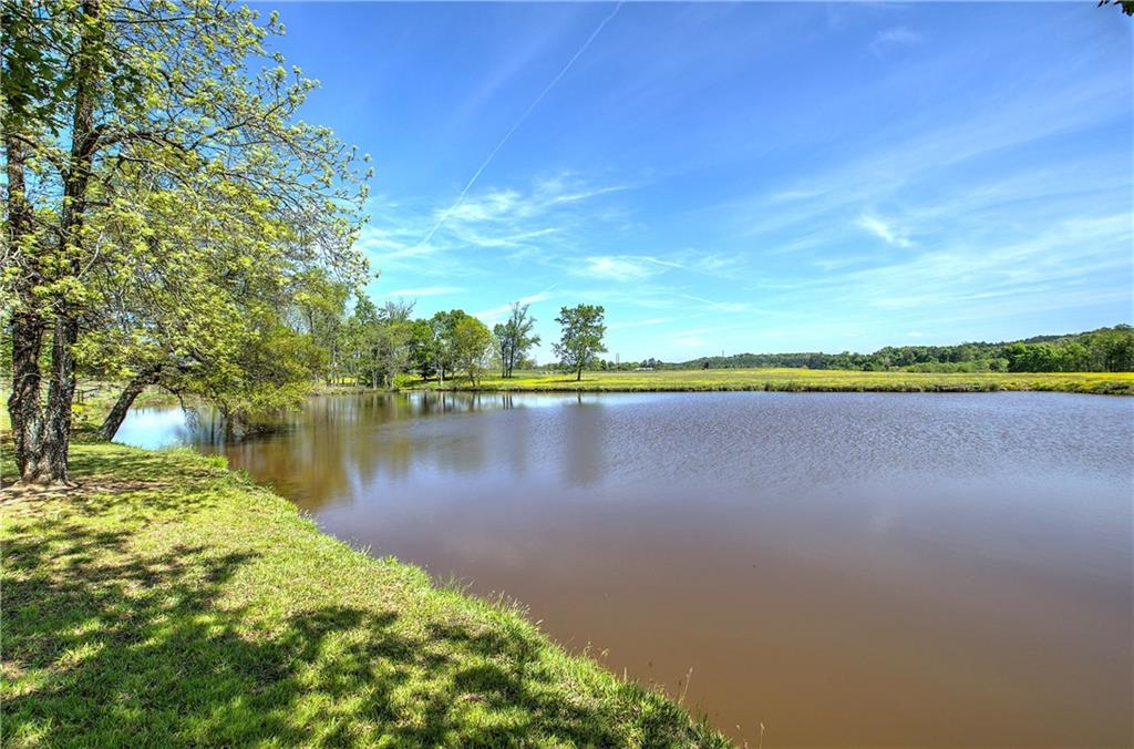 486 County Line Road Resaca, GA 30735 - Photo 21 of 49 a view of a lake with a city