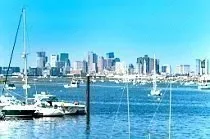 a view of a lake with tall building