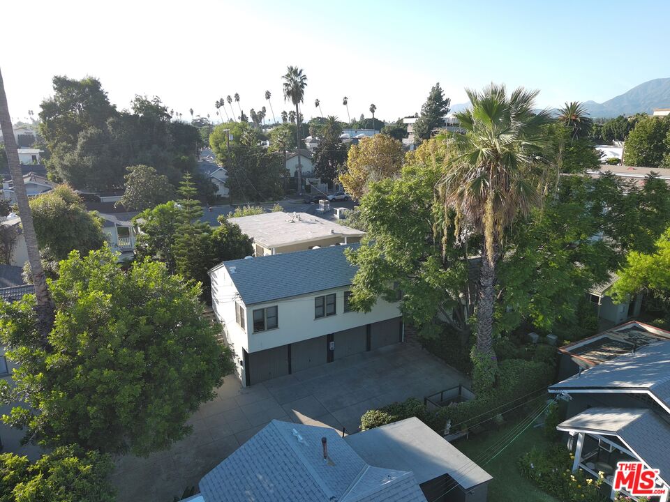 2599 Morningside Street, Unit D Pasadena, CA 91107 - Photo 2 of 13 a view of a terrace with a garden and trees