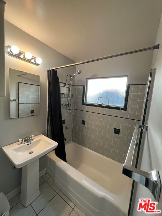 2599 Morningside Street, Unit D Pasadena, CA 91107 - Photo 10 of 13 a bathroom with a sink a mirror and a bathtub
