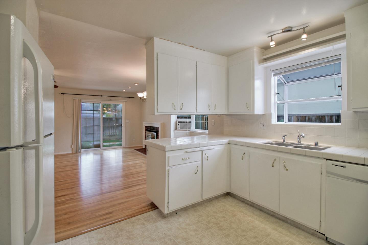 640 Harriet Avenue Campbell, CA 95008 - Photo 5 of 14 a kitchen with sink and cabinets