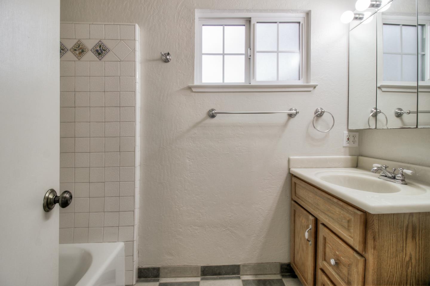 640 Harriet Avenue Campbell, CA 95008 - Photo 8 of 14 a bathroom with a sink a toilet and shower