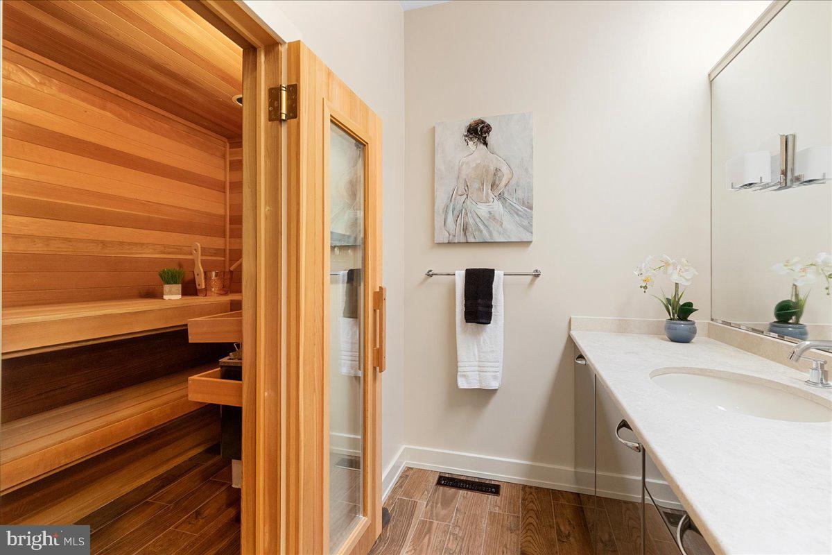 34 Littlebrook Road Princeton, NJ 08540 - Photo 32 of 87 a bathroom with a sink and a mirror