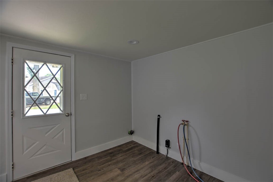 33 Lake Grove Club Decatur, IL 62521 - Photo 18 of 24 an empty room with wooden floor and a window
