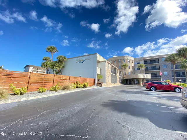 a building with trees in front of it
