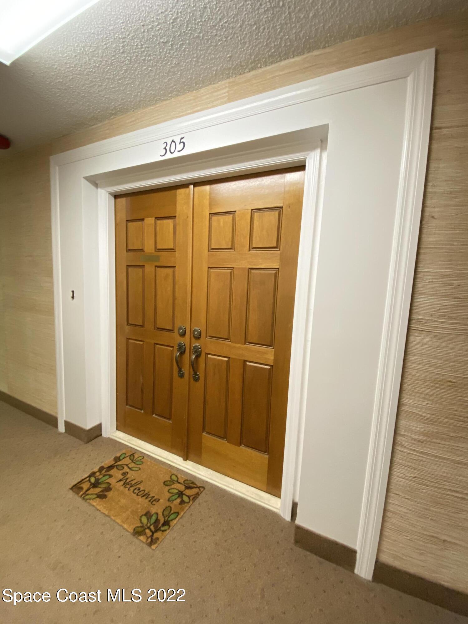 333 North Atlantic Avenue, Unit 305 Cocoa Beach, FL 32931 - Photo 5 of 21 a view of a closet