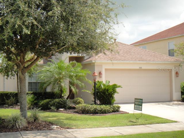 15311 Skip Jack Loop Lakewood Ranch, FL 34202 - Photo 1 of 1 a front view of a house with a yard