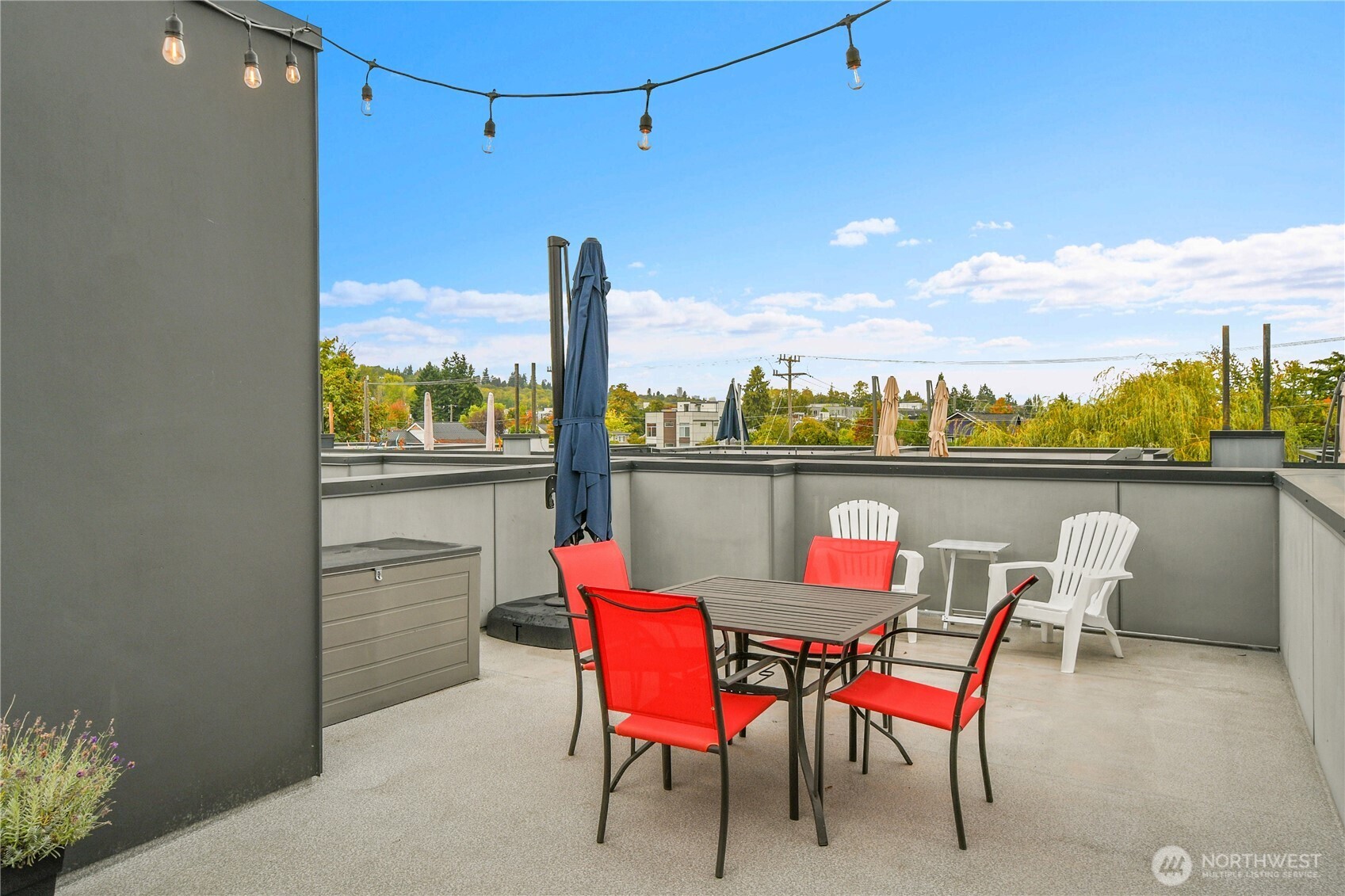 5009 Renton Avenue South, Unit C Seattle, WA 98118 - Photo 19 of 26 a dining room with furniture and a floor to ceiling window