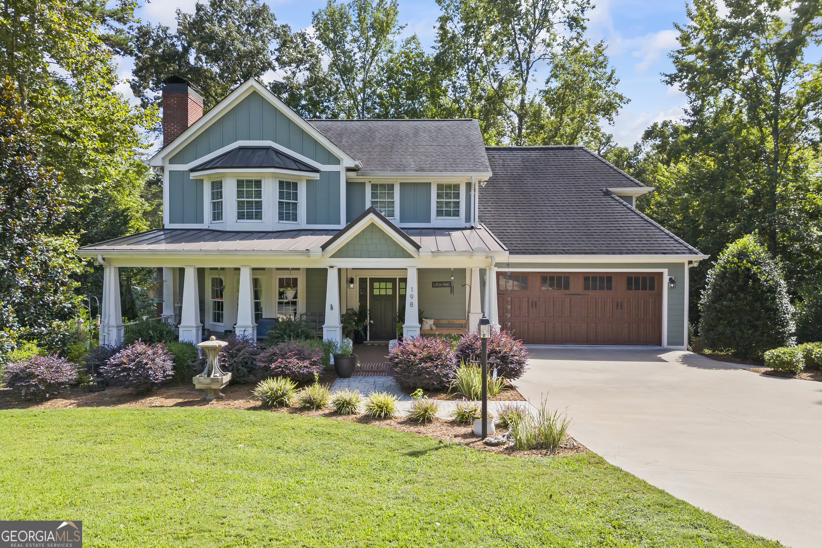 198 Wesley Circle Toccoa, GA 30577 - Photo 1 of 1 a front view of a house with a yard porch and patio