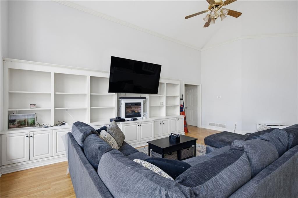 7387 Milam Road Winston, GA 30187 - Photo 11 of 41 a living room with furniture and a flat screen tv