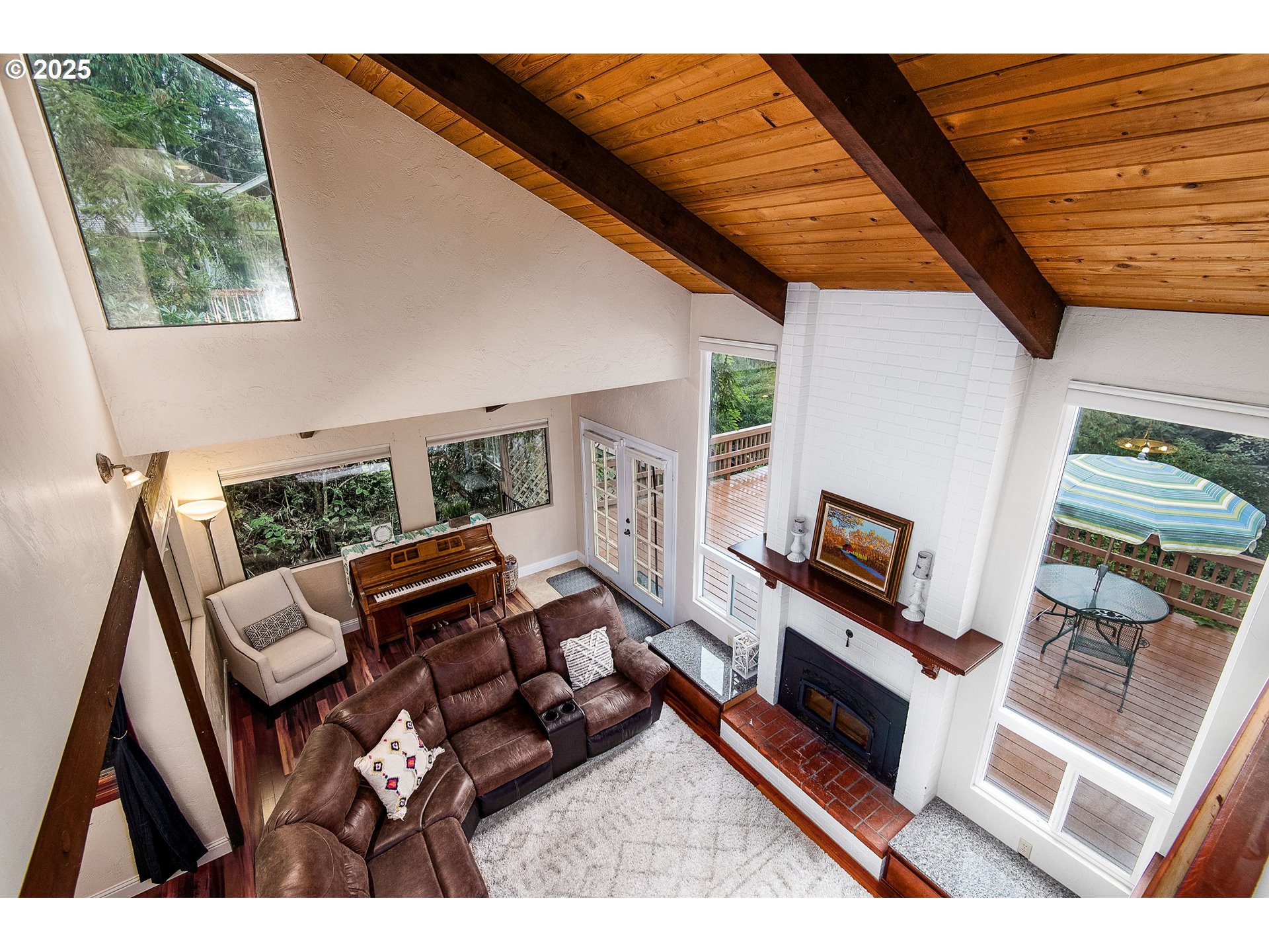 5001 Ford Way Florence, OR 97439 - Photo 14 of 48 a living room with furniture fireplace and a flat screen tv
