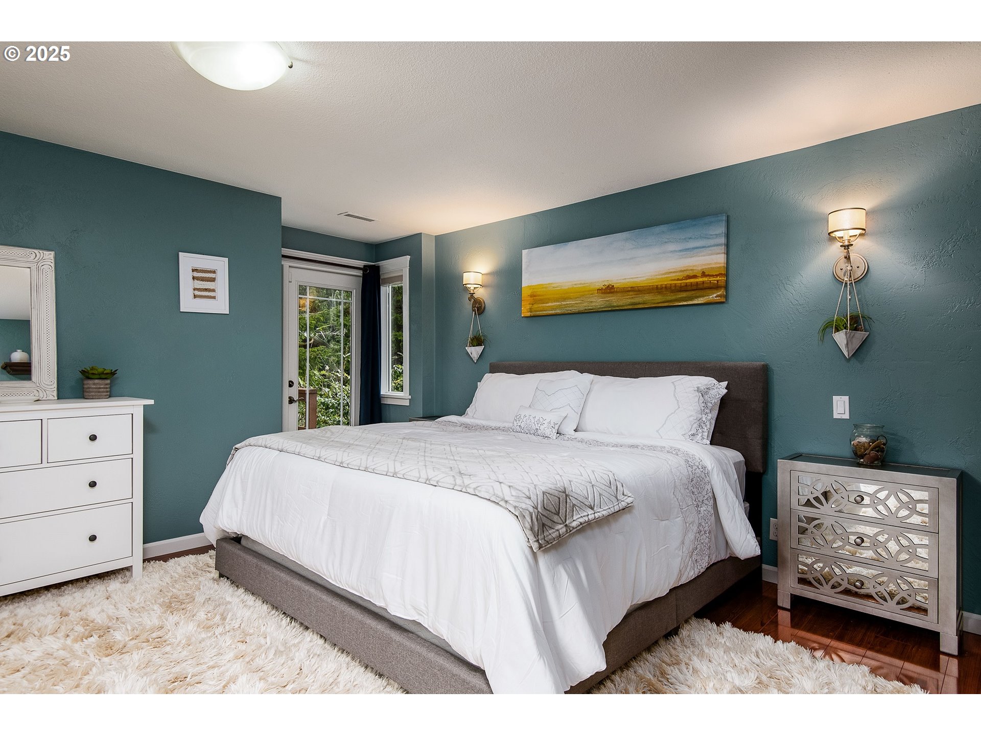 5001 Ford Way Florence, OR 97439 - Photo 20 of 48 a bedroom with a bed and a night stand