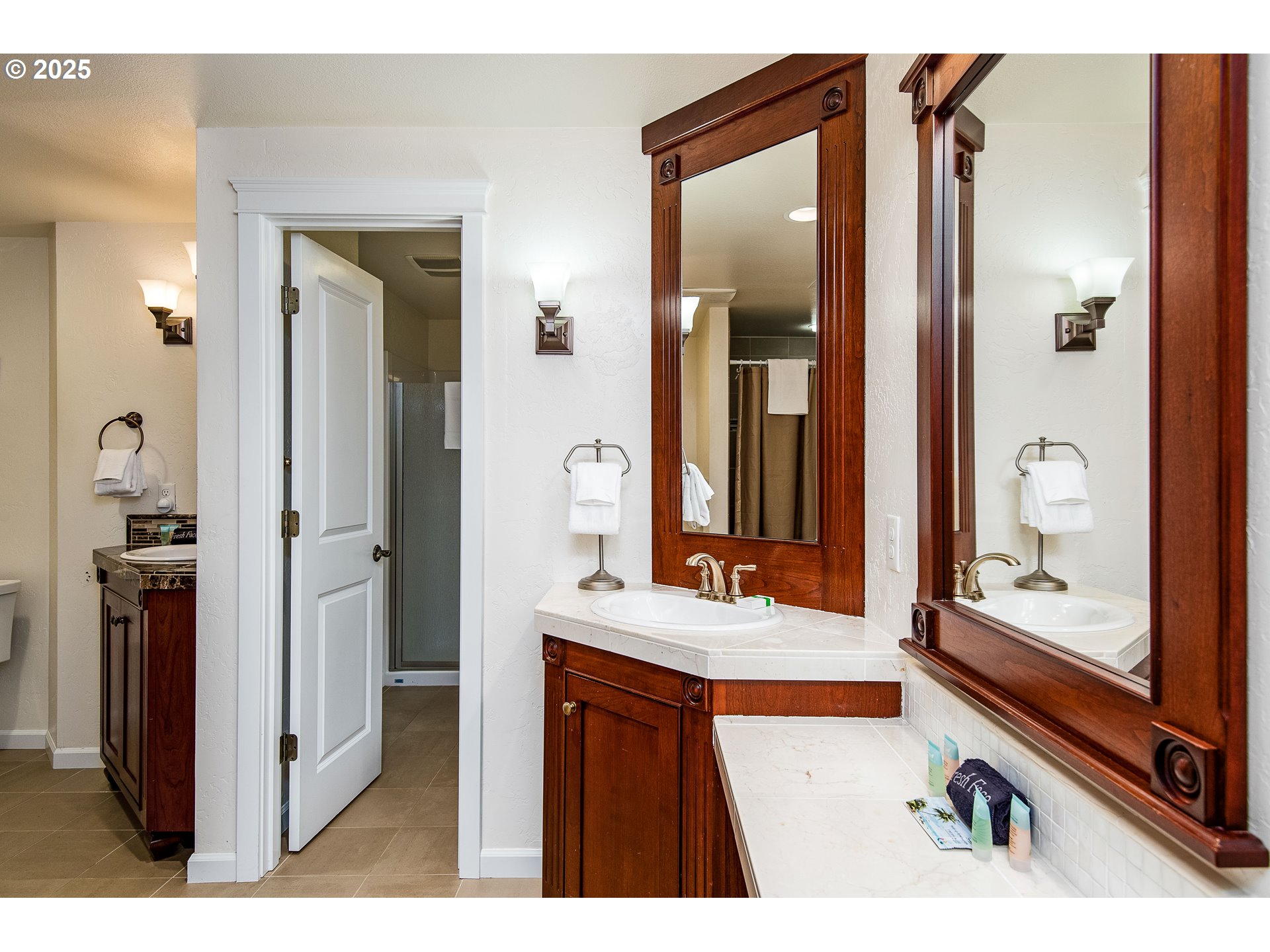 5001 Ford Way Florence, OR 97439 - Photo 23 of 48 a bathroom with a sink a mirror and a shower