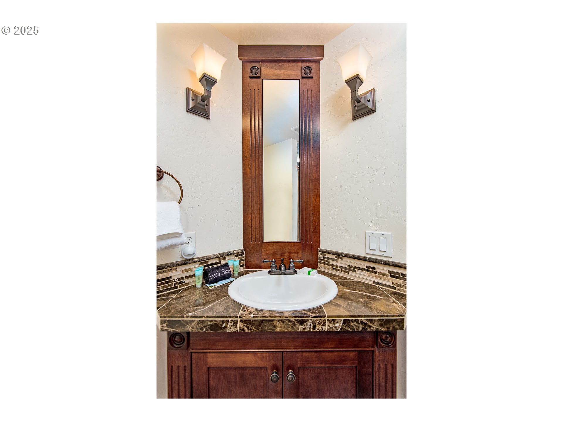5001 Ford Way Florence, OR 97439 - Photo 25 of 48 a bathroom with a sink and a mirror