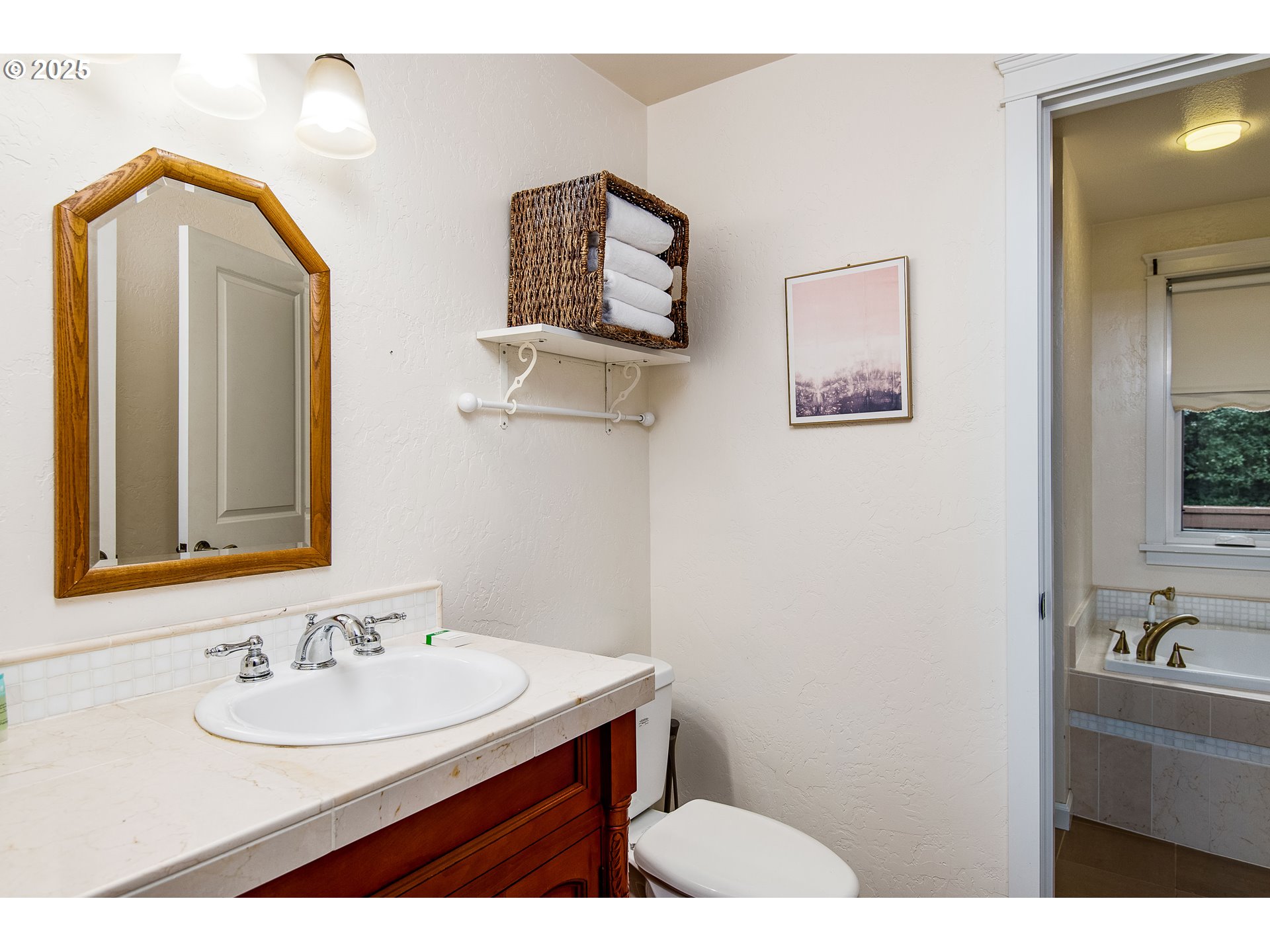 5001 Ford Way Florence, OR 97439 - Photo 28 of 48 a bathroom with a sink and a mirror