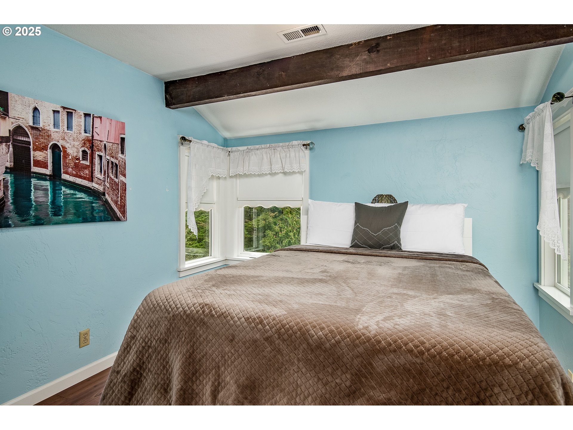 5001 Ford Way Florence, OR 97439 - Photo 30 of 48 a bedroom with a bed and a window