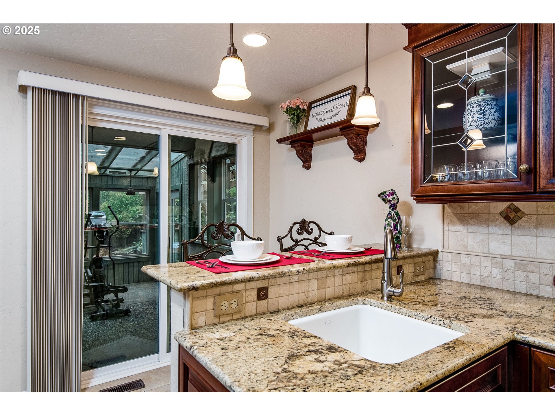 5001 Ford Way Florence, OR 97439 - Photo 7 of 48 a bathroom with a granite countertop sink and a mirror