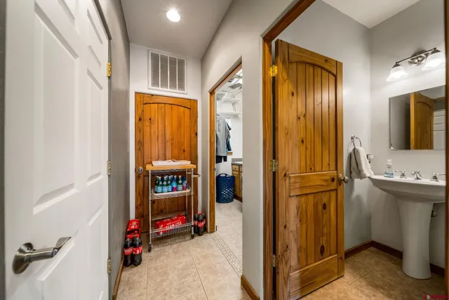 a view of an entryway with a bathroom