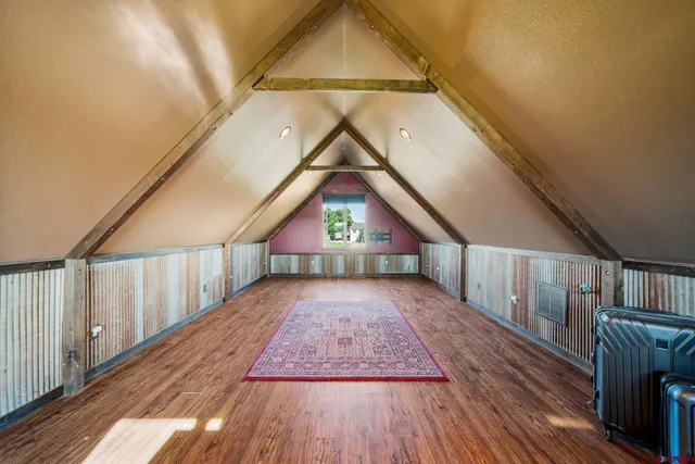 a view of entryway in wooden floor