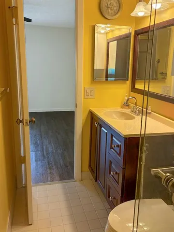 a bathroom with a shower and a toilet shower