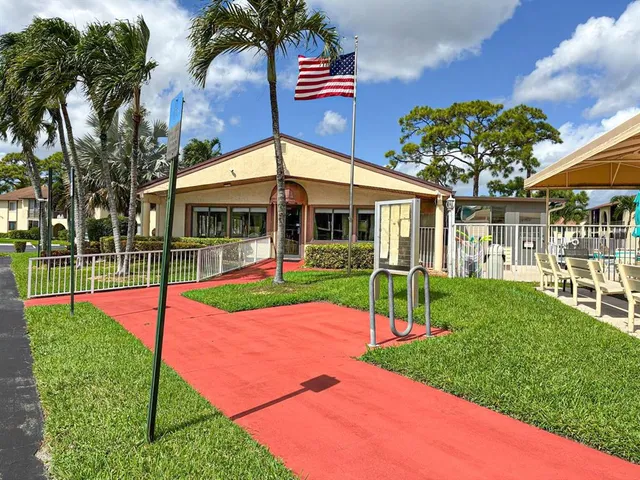 a view of a house with a big yard