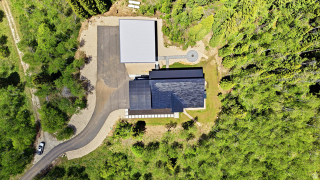 1000 West Upper Cove Road Park City, UT 84098 - Photo 59 of 63 Modern residential property surrounded by lush green foliage