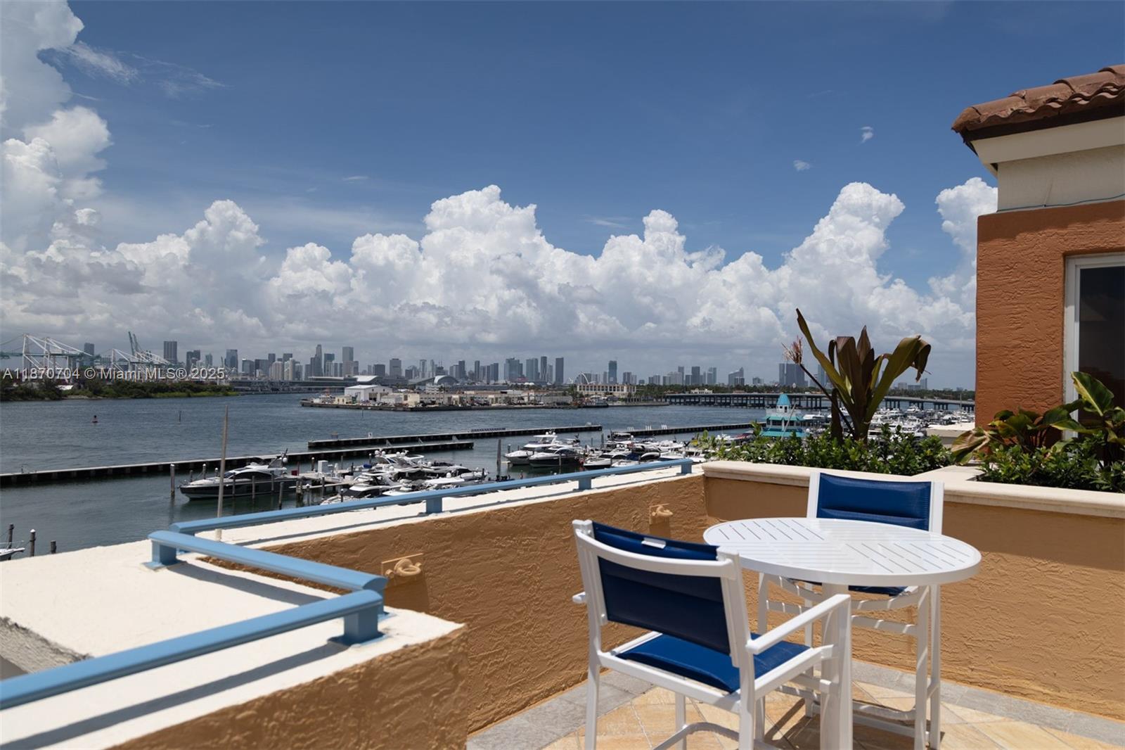 90 Alton Road, Unit 1702 Miami Beach, FL 33139 - Photo 28 of 49 a view of a swimming pool with a patio