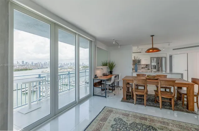 a dining hall with furniture window and outside view