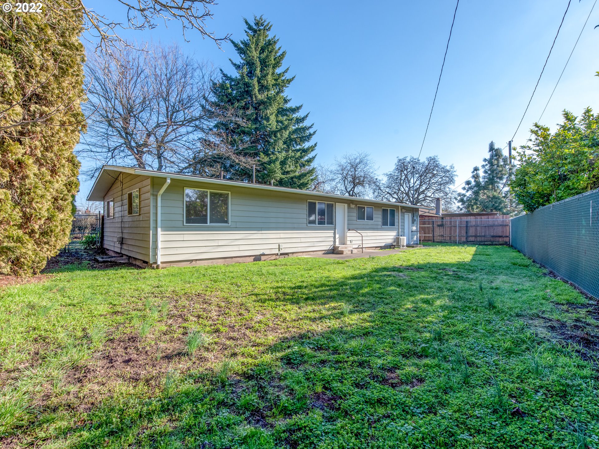 2332 Shadylane Drive Springfield, OR 97477 - Photo 24 of 27 a backyard of a house with lots of green space