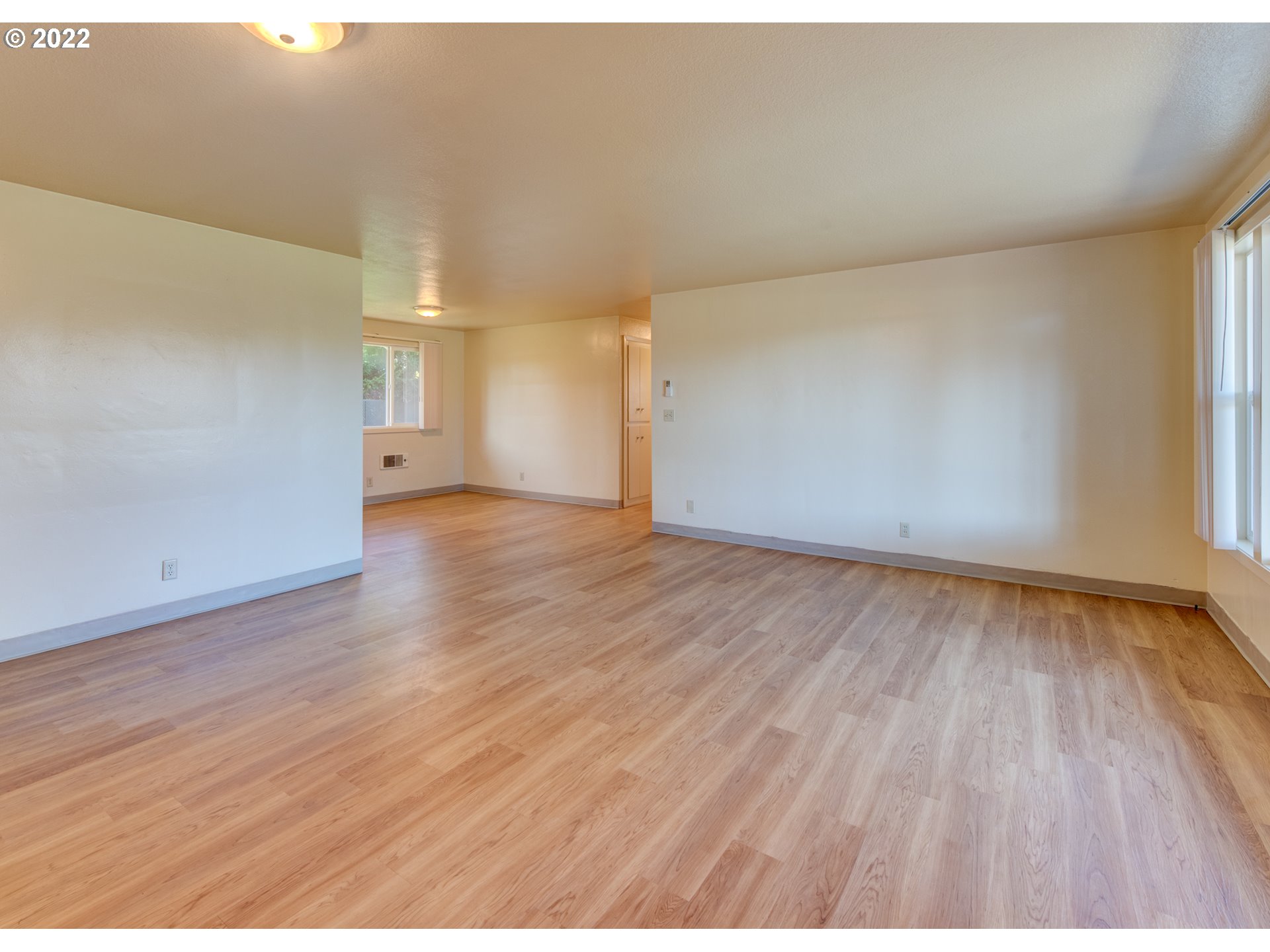 2332 Shadylane Drive Springfield, OR 97477 - Photo 8 of 27 a view of an empty room and wooden floor