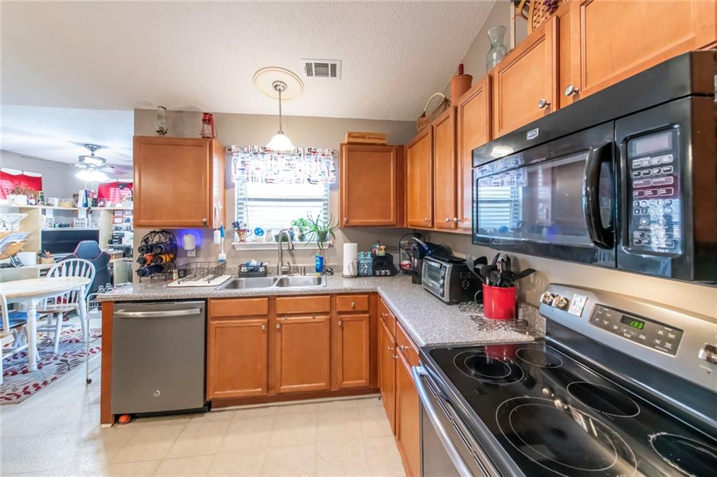 170 Baskin Road Temple, GA 30179 - Photo 14 of 34 a kitchen that has a sink and a stove