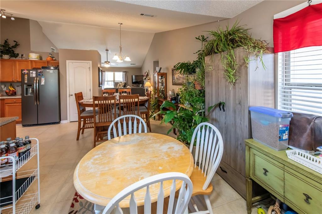 170 Baskin Road Temple, GA 30179 - Photo 16 of 34 a view of a dining room with furniture and chandelier