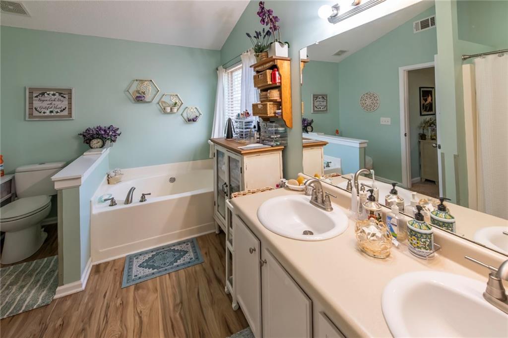 170 Baskin Road Temple, GA 30179 - Photo 21 of 34 a bathroom with a sink and a mirror