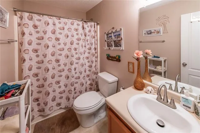 a bathroom with a sink and a toilet