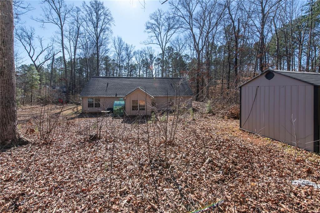 170 Baskin Road Temple, GA 30179 - Photo 31 of 34 a backyard of a house with lots of green space