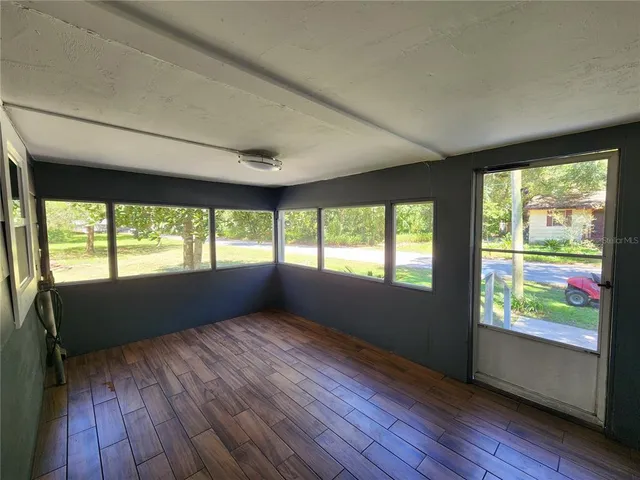 a view of an empty room and window