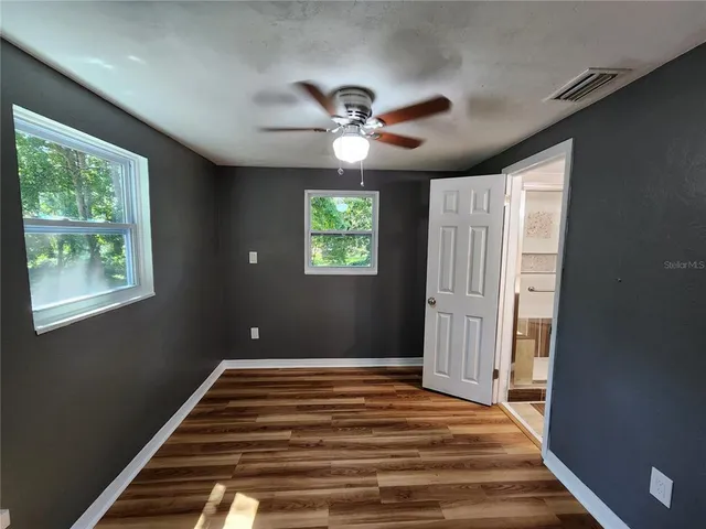 a bathroom with a tub and a shower