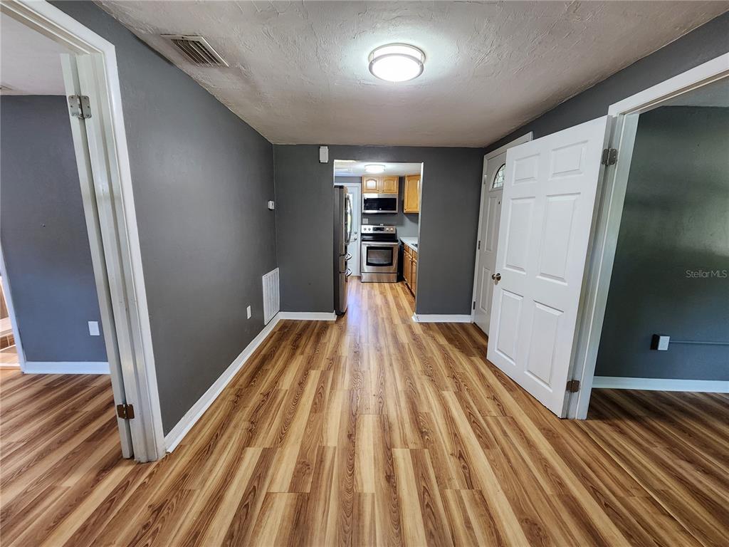 106 Southwest 6th Street Micanopy, FL 32667 - Photo 56 of 62 a view of a room with wooden floor