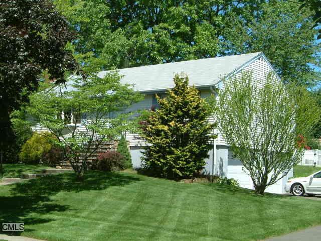 240 Post Oak Road Stratford, CT 06614 - Photo 1 of 1 a backyard of a house with lots of green space