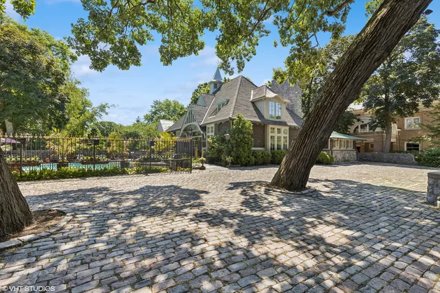 a view of swimming pool from a tree