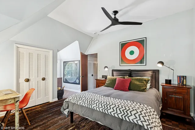 a living room with lots of furniture and a flat screen tv