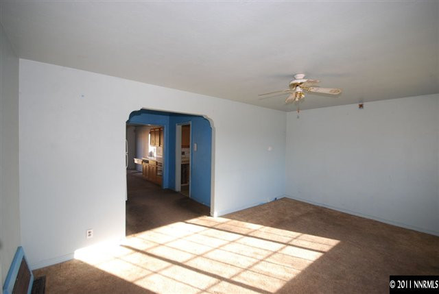 1231 East 9th Street Reno, NV 89512 - Photo 2 of 13 a view of a hallway with a chandelier
