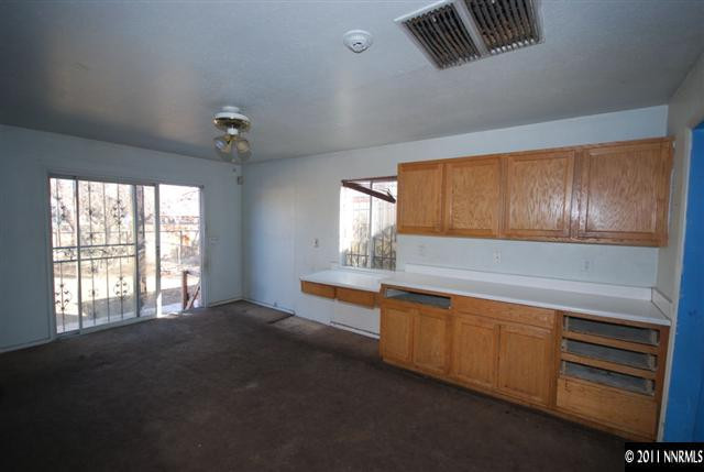 1231 East 9th Street Reno, NV 89512 - Photo 8 of 13 a large room with windows