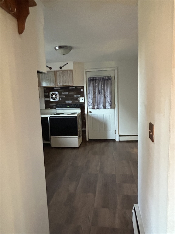 286 Westfield Road Holyoke, MA 01040 - Photo 12 of 26 a view of an empty room with a fireplace